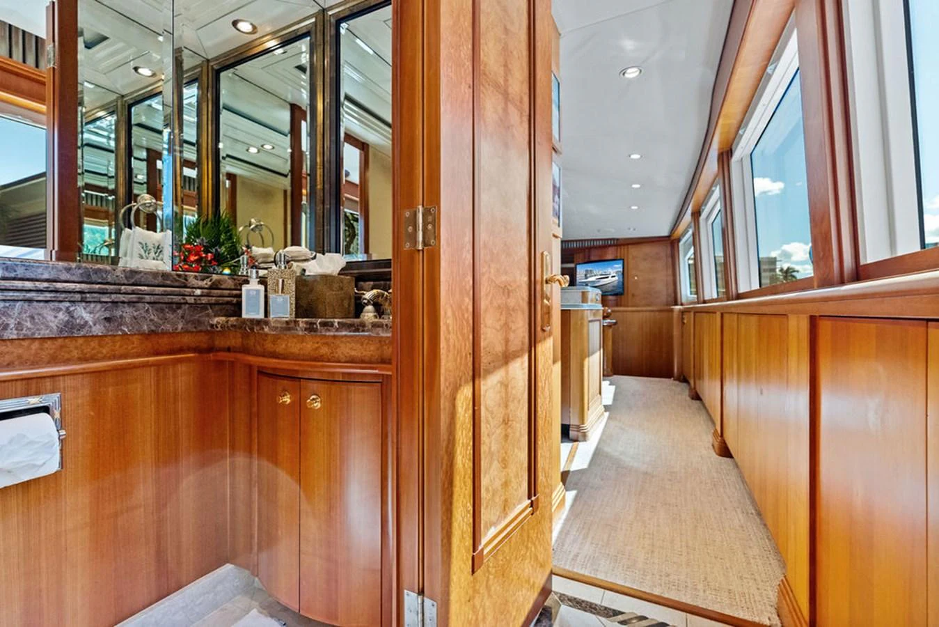 a bathroom with a large mirror aboard PICOSA LADY Yacht for Sale