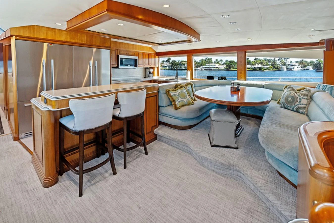 a living room with a table and chairs aboard PICOSA LADY Yacht for Sale