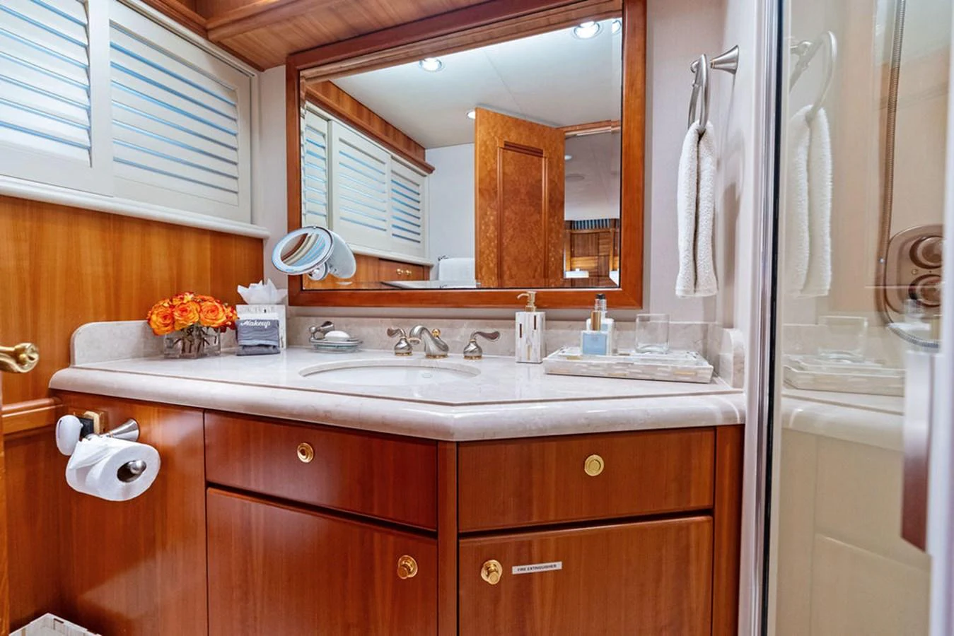 a kitchen with a sink and cabinets aboard PICOSA LADY Yacht for Sale
