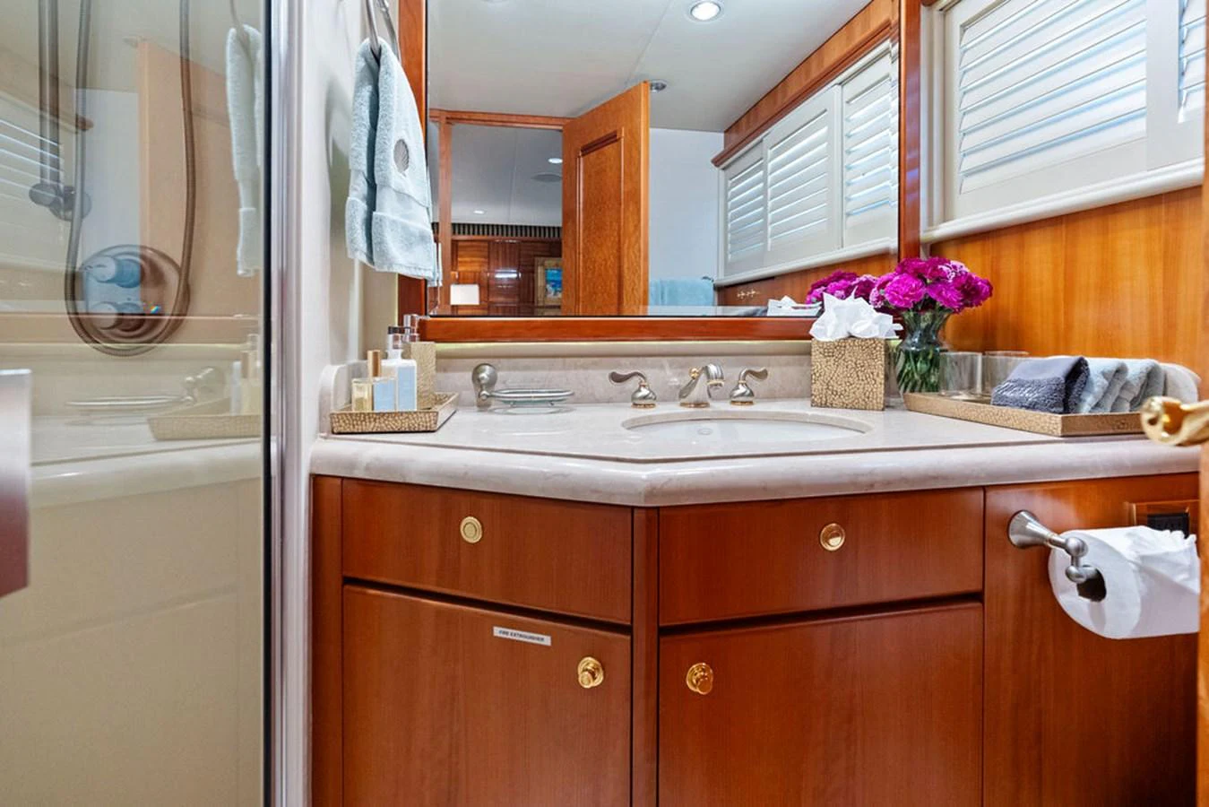 a bathroom with a sink and cabinets aboard PICOSA LADY Yacht for Sale