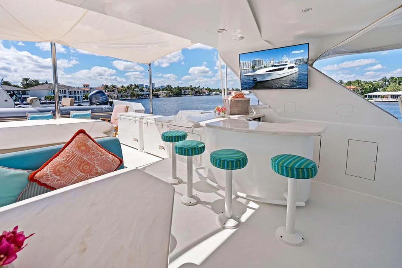 a room with tables and chairs aboard PICOSA LADY Yacht for Sale