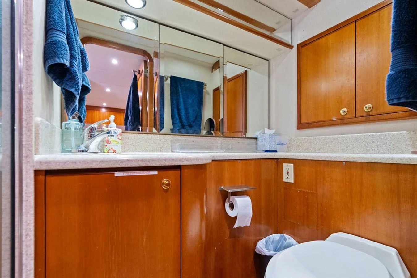 a bathroom with a sink and cabinets aboard PICOSA LADY Yacht for Sale