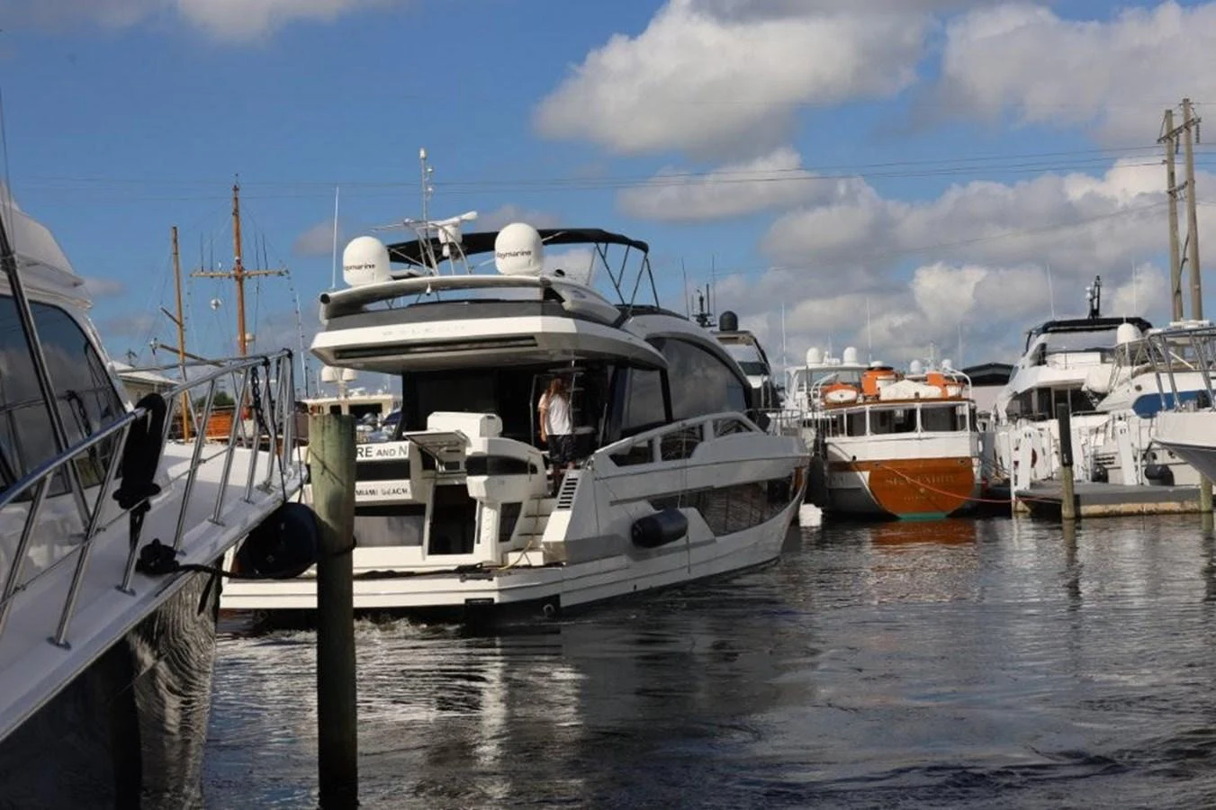 boats docked at a pier aboard GLN65001J819 Yacht for Sale