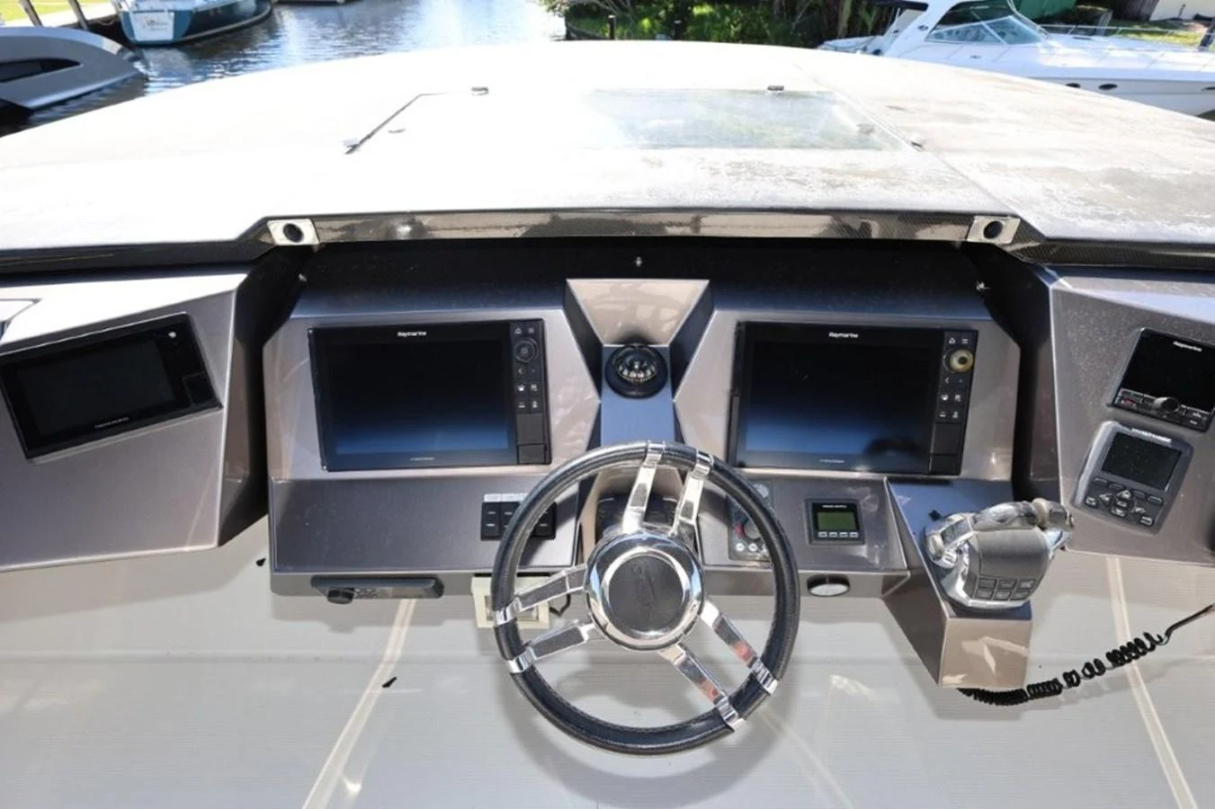 a car with a steering wheel aboard GLN65001J819 Yacht for Sale