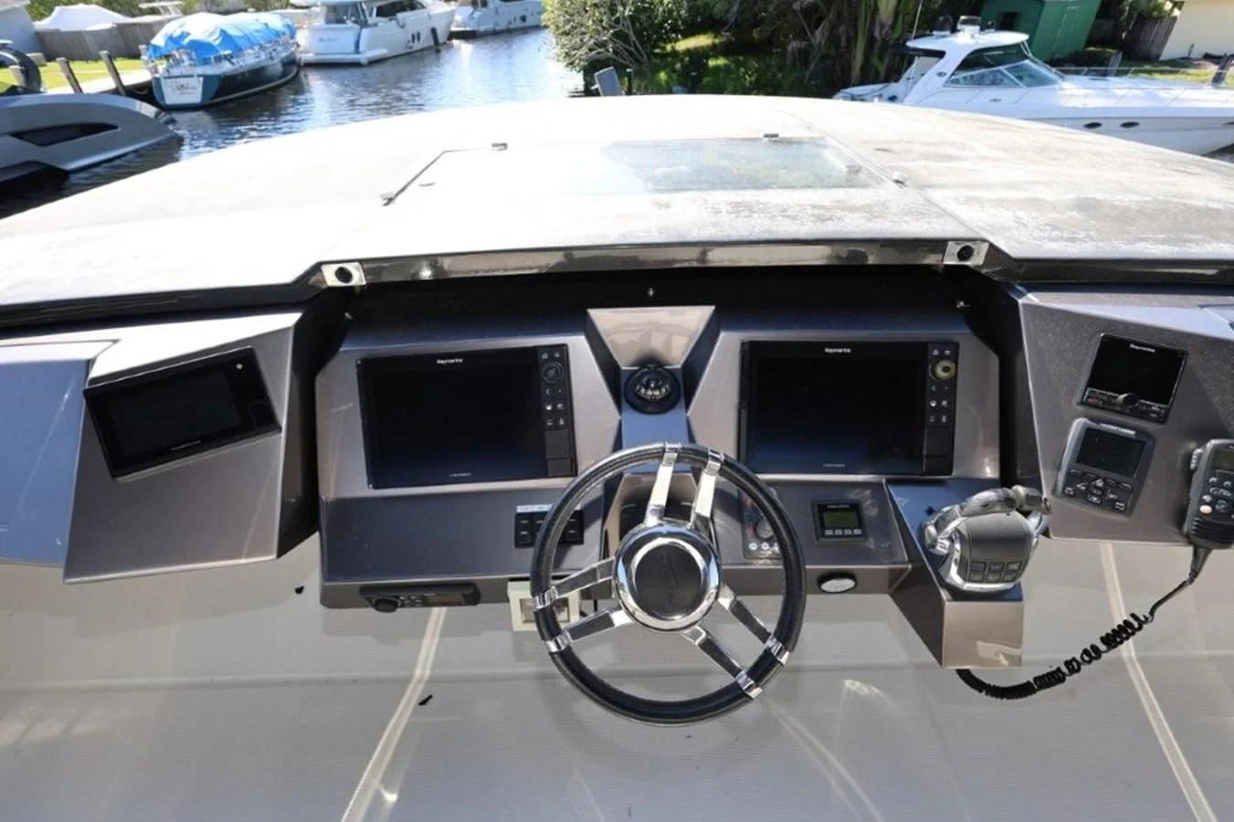 a car with a steering wheel aboard GLN65001J819 Yacht for Sale