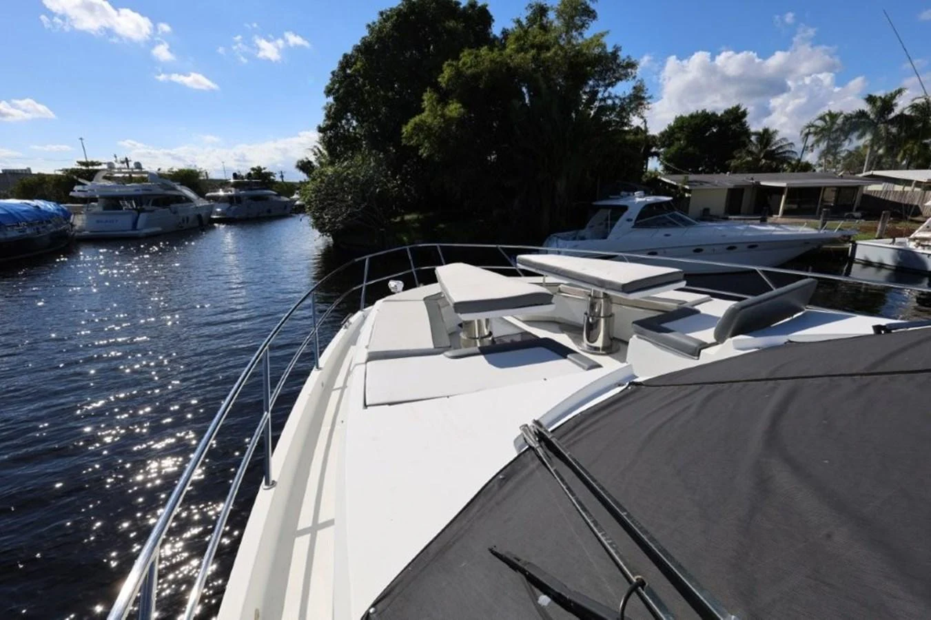 a group of boats on a river aboard GLN65001J819 Yacht for Sale
