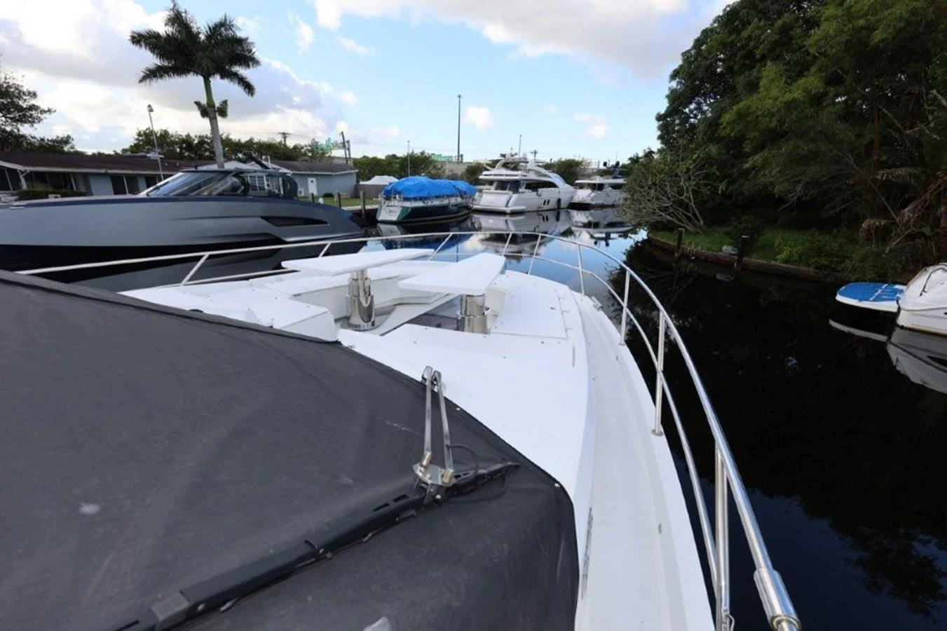 a long white boat in a harbor aboard GLN65001J819 Yacht for Sale
