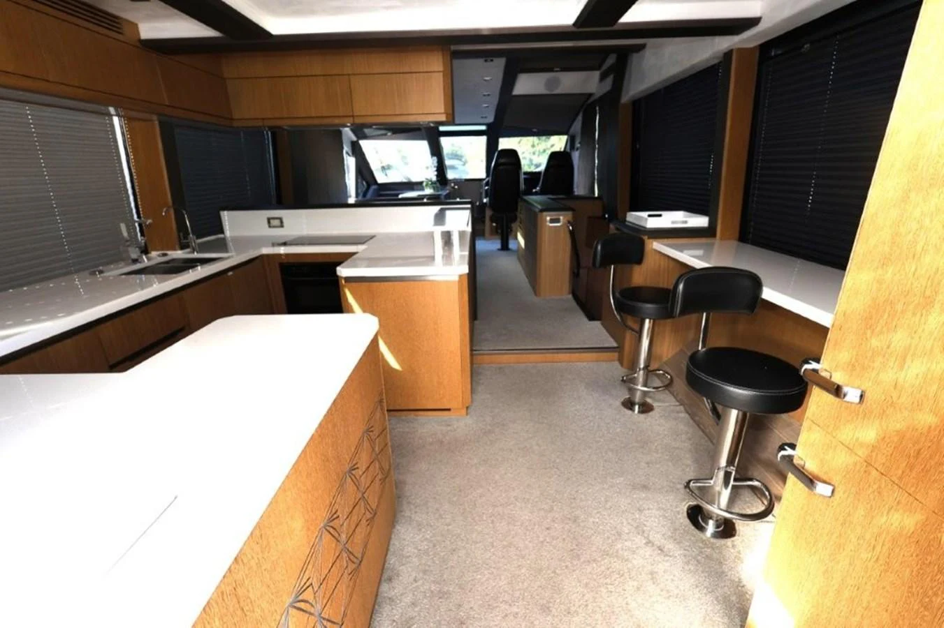 a room with a desk and chairs aboard GLN65001J819 Yacht for Sale