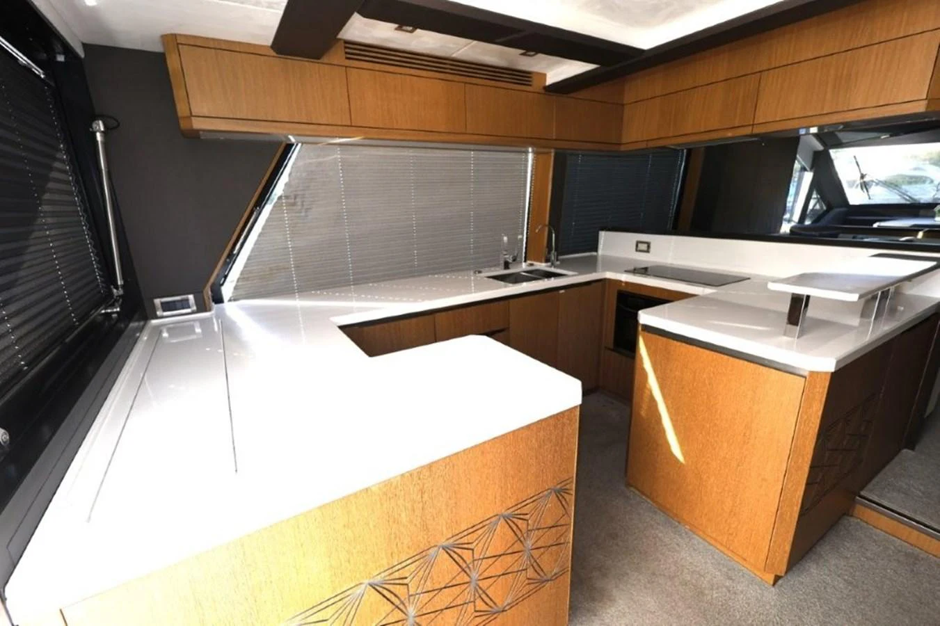 a kitchen with a large white counter aboard GLN65001J819 Yacht for Sale