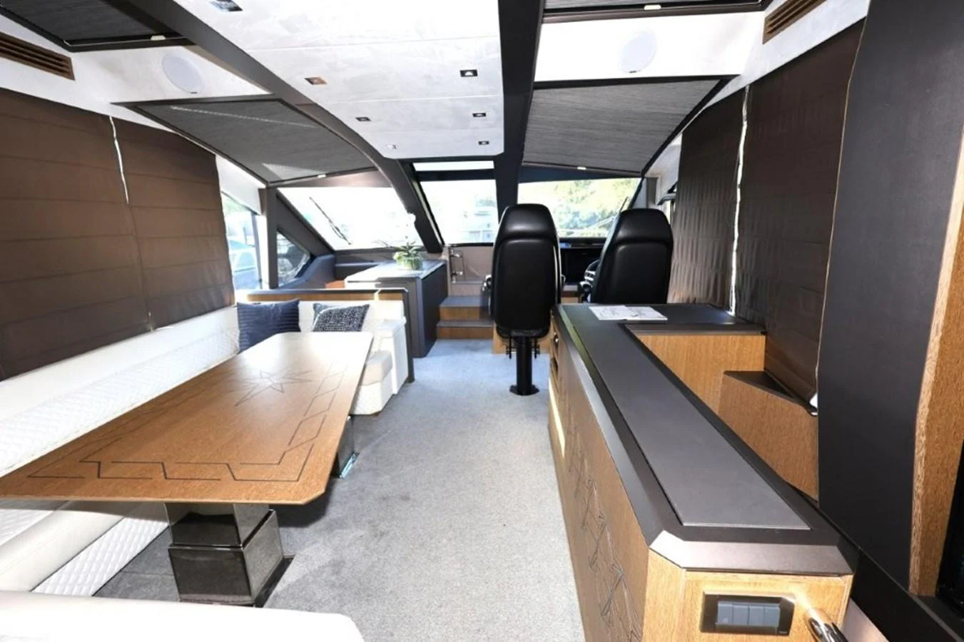 a room with a desk and chairs aboard GLN65001J819 Yacht for Sale