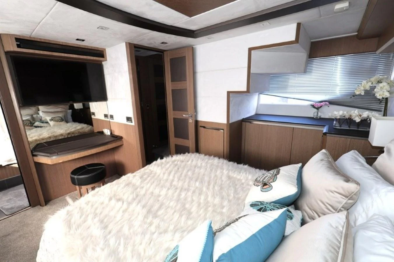 a bedroom with a bed and piano aboard GLN65001J819 Yacht for Sale