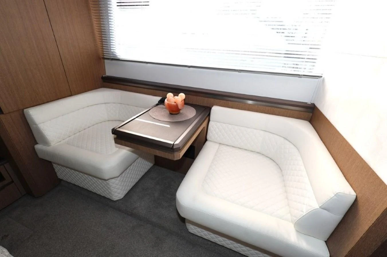 a couch and a coffee table aboard GLN65001J819 Yacht for Sale