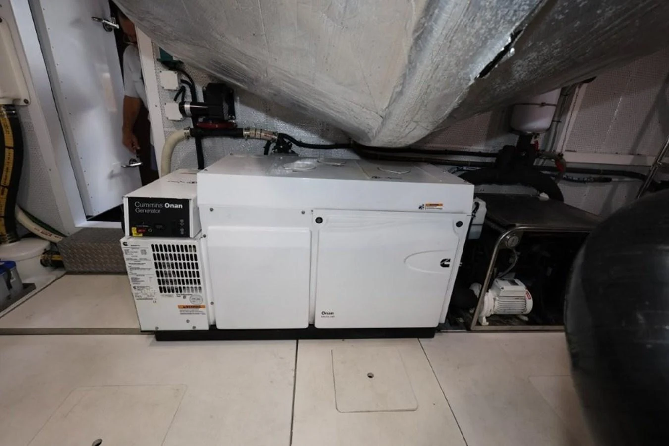 a white machine with a black label aboard GLN65001J819 Yacht for Sale