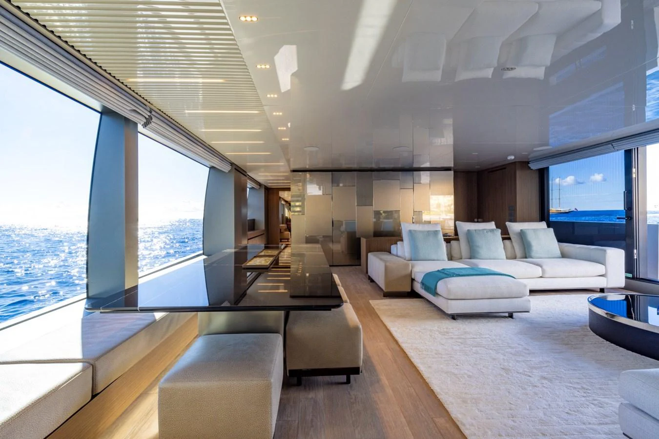 The salon offers a spacious and luxurious seating area with panoramic ocean views. aboard LADY LU' Yacht for Sale