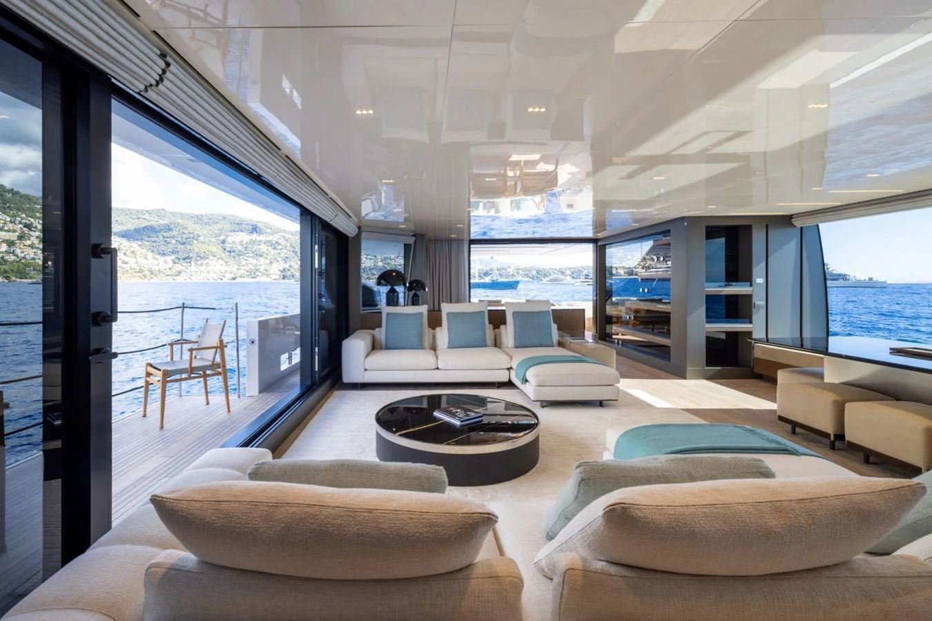 The spacious salon offers panoramic views and luxurious seating arrangements. aboard LADY LU' Yacht for Sale