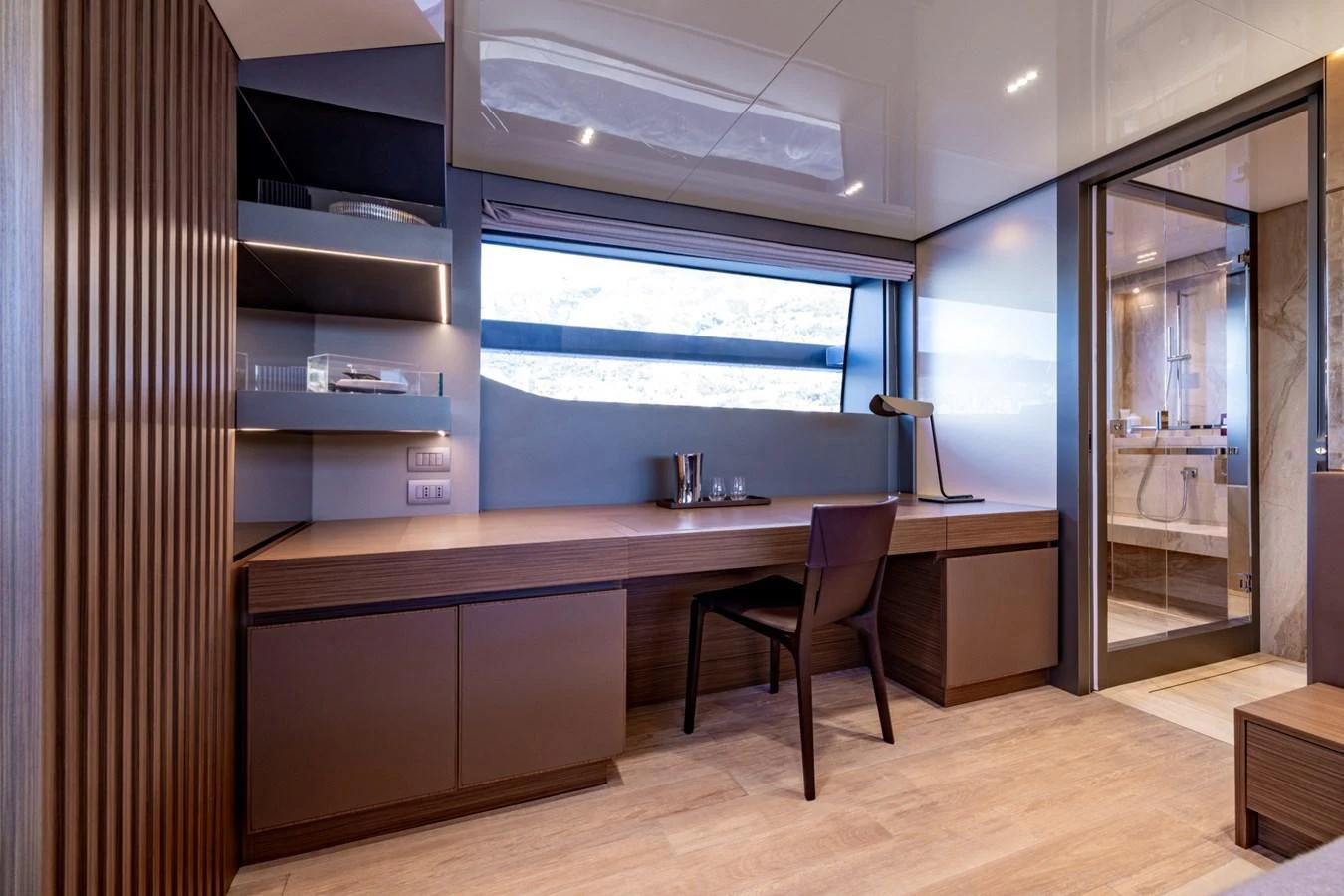 A modern yacht office space with sleek furnishings and ample natural light. aboard LADY LU' Yacht for Sale