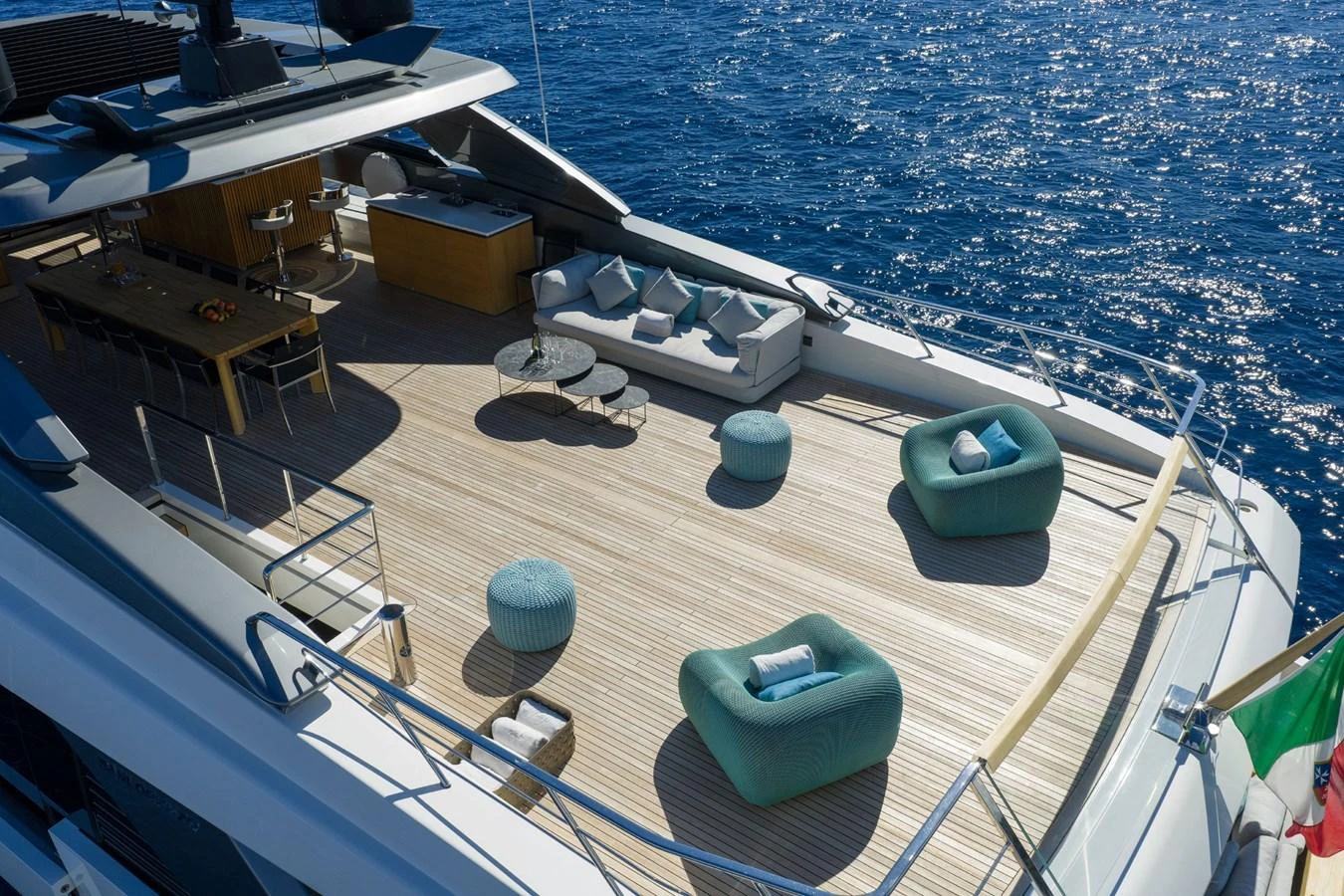 The sundeck offers a spacious and luxurious area for relaxation with comfortable seating and stunning ocean views. aboard LADY LU' Yacht for Sale