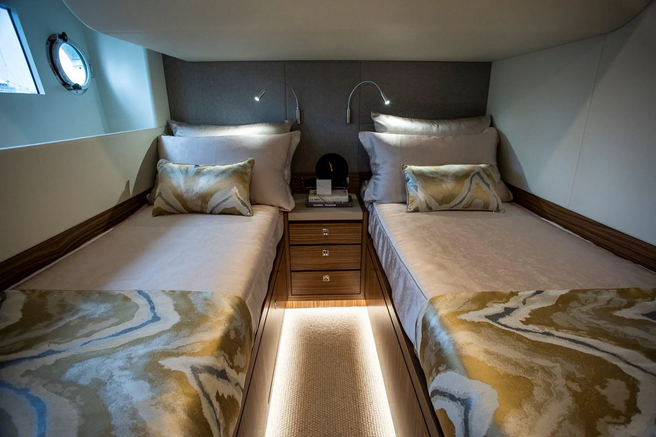 a room with two beds aboard 70' JOHNSON SKYLOUNGE 2026 Yacht for Sale