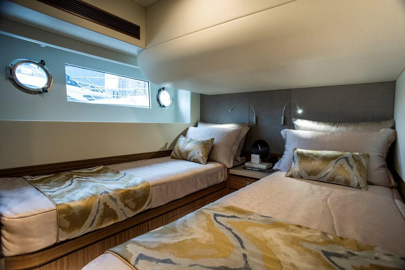 a couple of beds in a room aboard 70' JOHNSON SKYLOUNGE 2026 Yacht for Sale