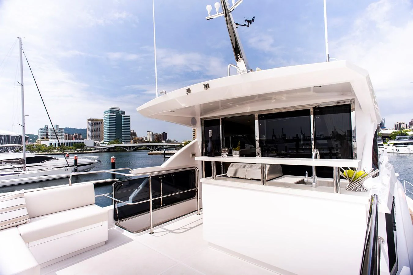 a boat on the water aboard 70' JOHNSON SKYLOUNGE 2026 Yacht for Sale