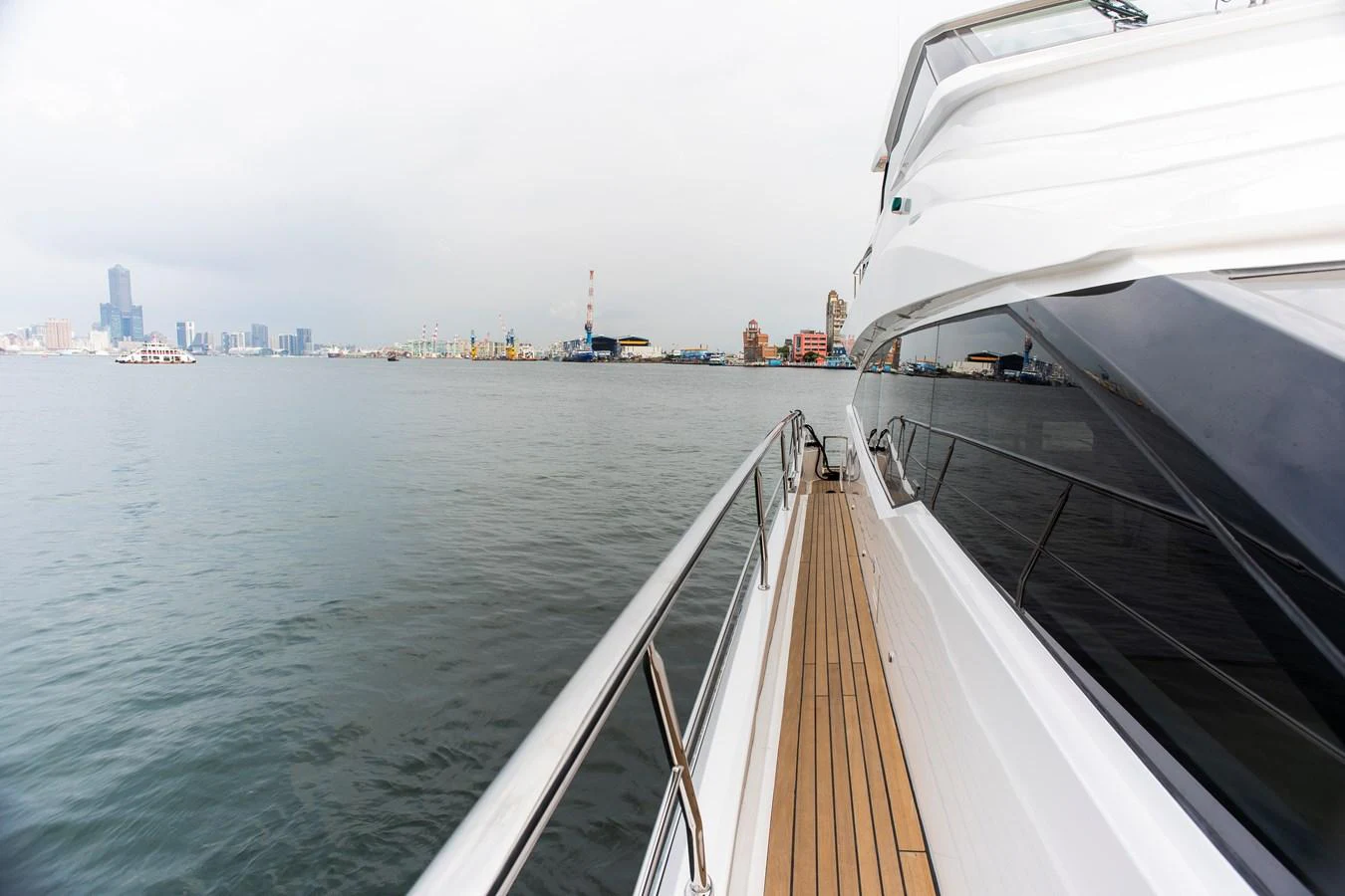 a view of a city from a boat aboard 70' JOHNSON SKYLOUNGE 2026 Yacht for Sale
