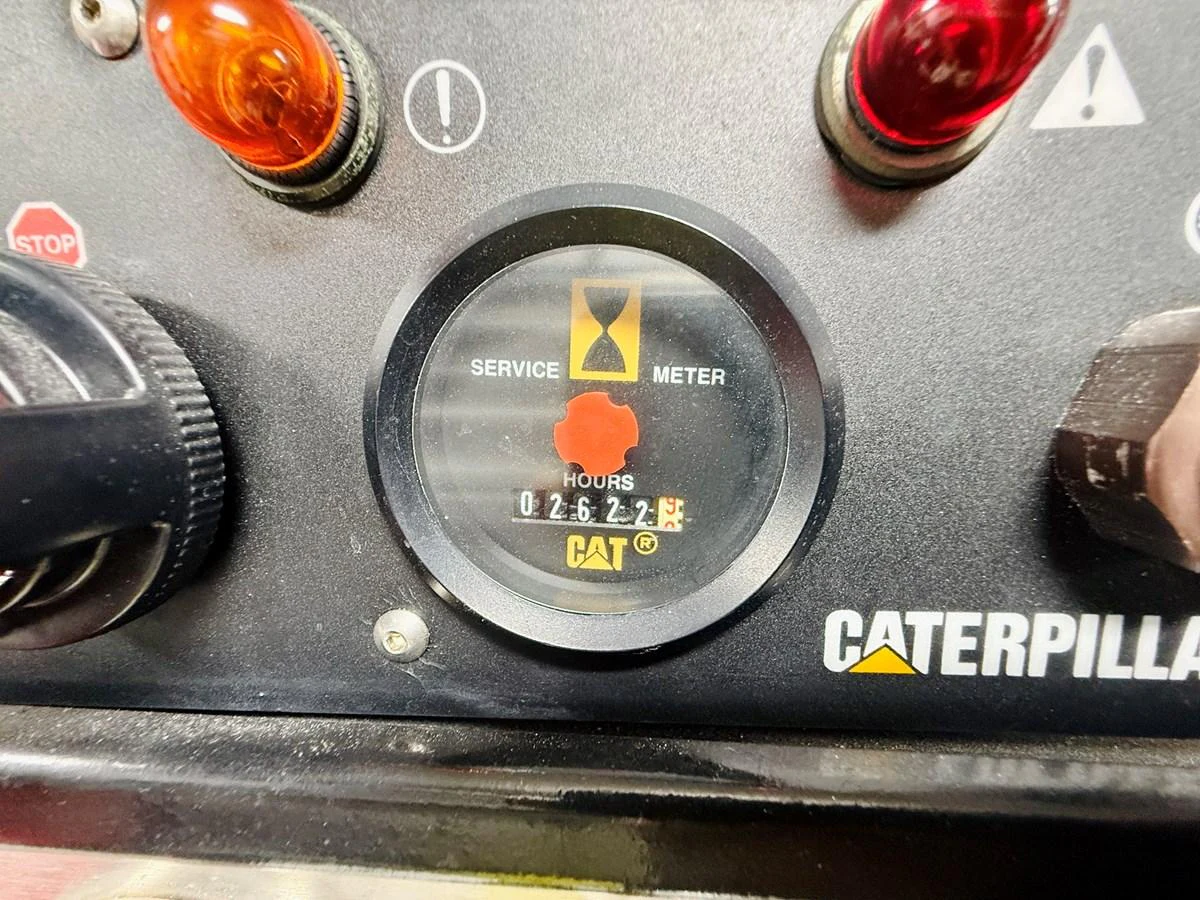 A close-up view of the engine service meter displaying hours of operation. aboard KICKBACK Yacht for Sale