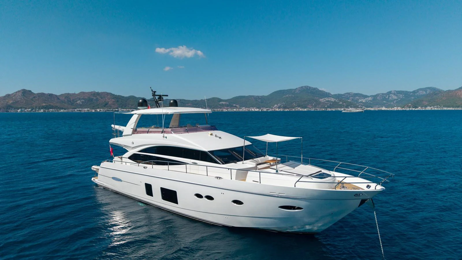 a white yacht in the water aboard MY LADY Yacht for Sale
