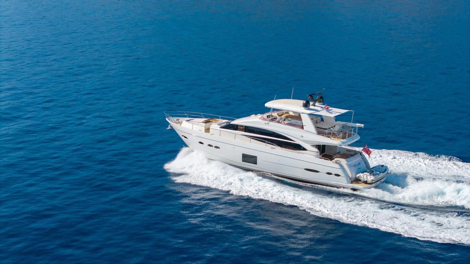 a white yacht in the water aboard MY LADY Yacht for Sale