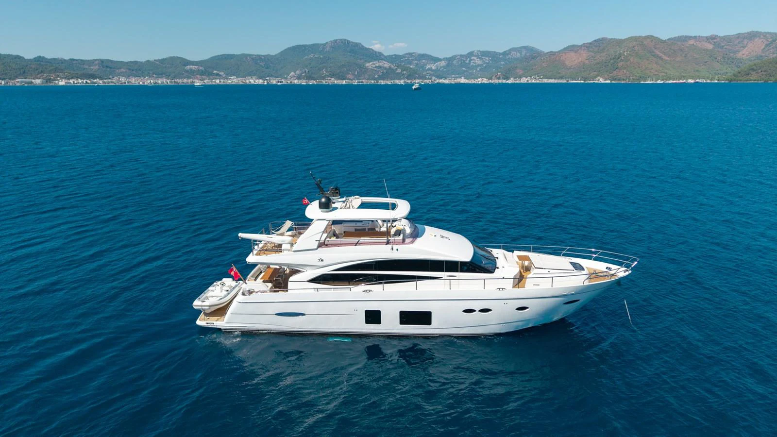 a white boat in the water aboard MY LADY Yacht for Sale