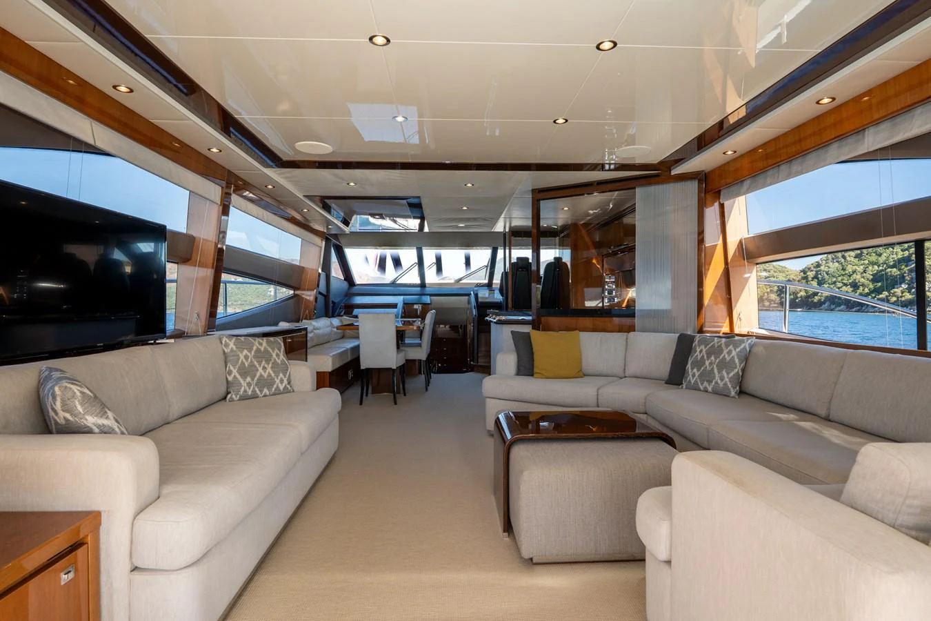 a living room with a couch and a tv aboard MY LADY Yacht for Sale