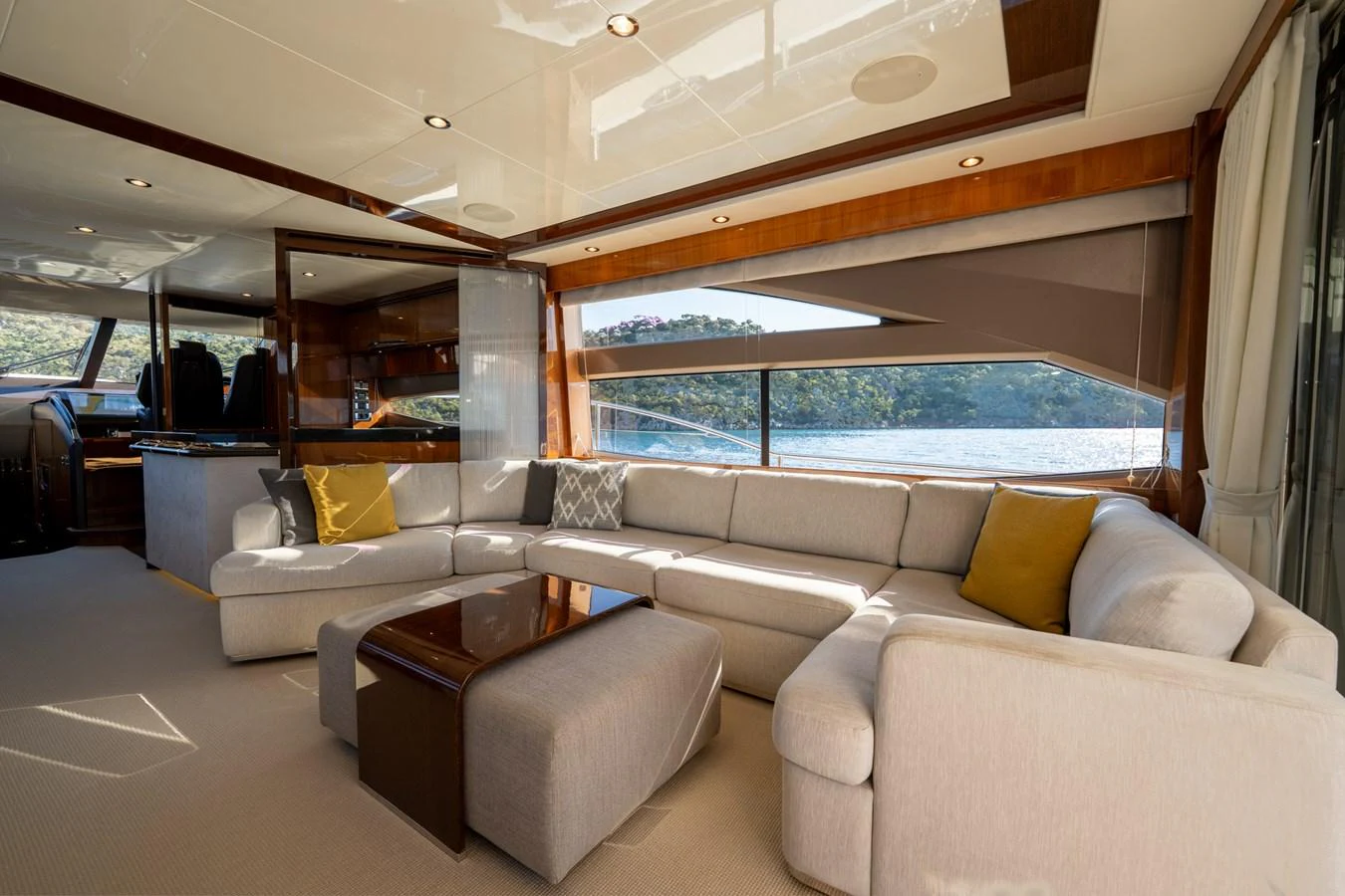a living room with a large window aboard MY LADY Yacht for Sale