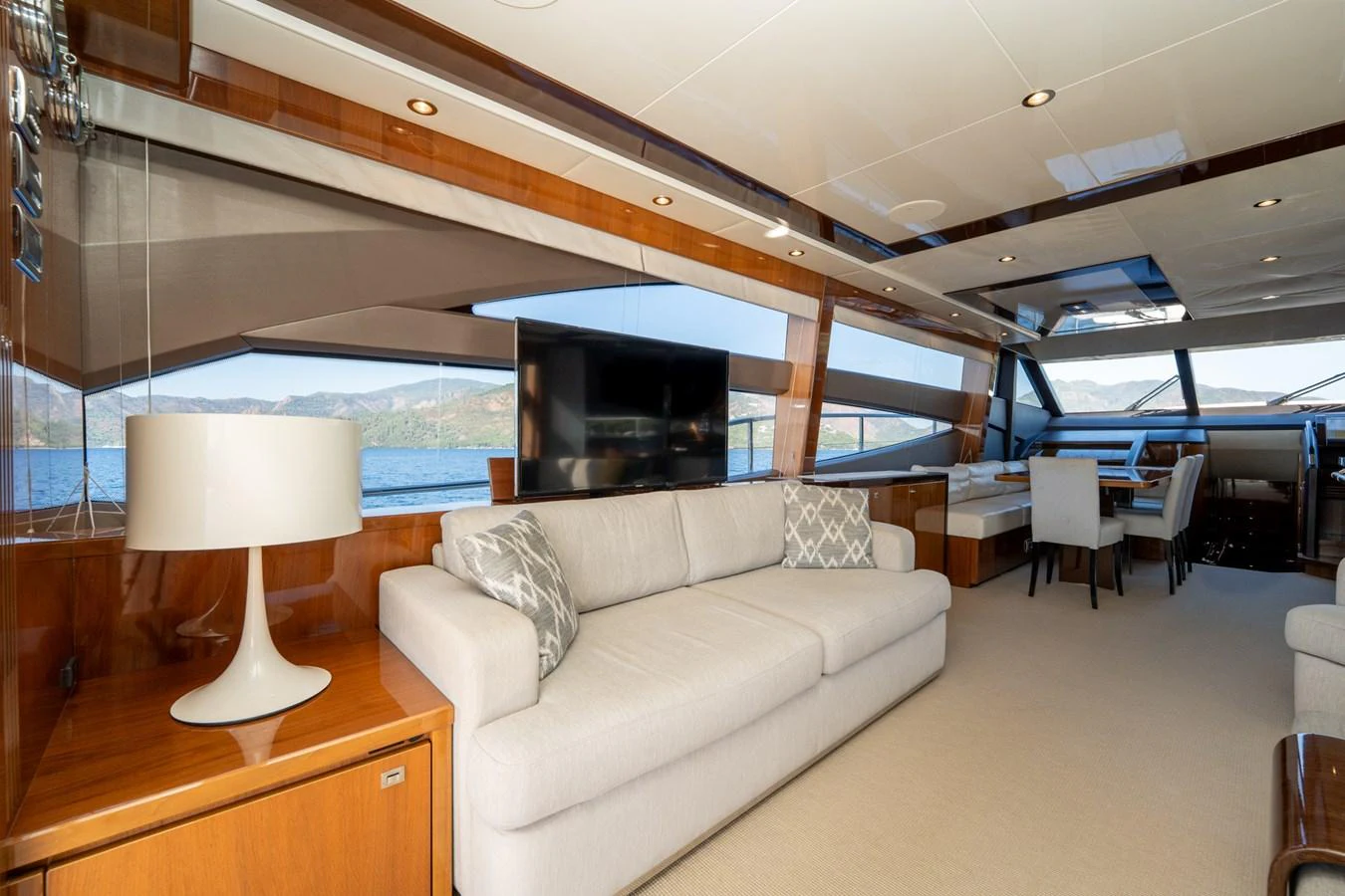 a living room with a large window aboard MY LADY Yacht for Sale