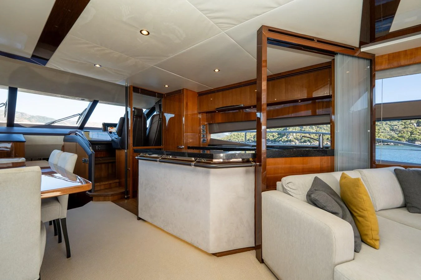 a living room with a couch and a table aboard MY LADY Yacht for Sale
