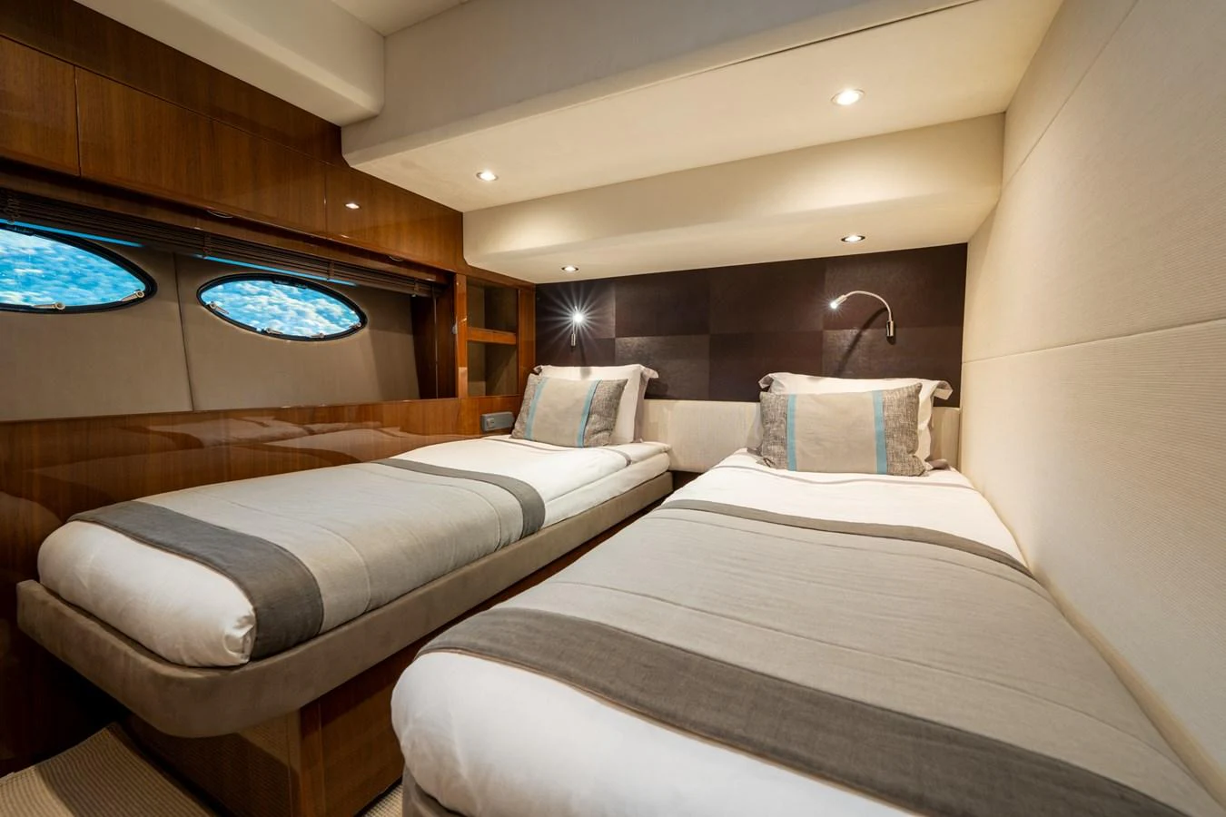 a couple of beds in a room aboard MY LADY Yacht for Sale
