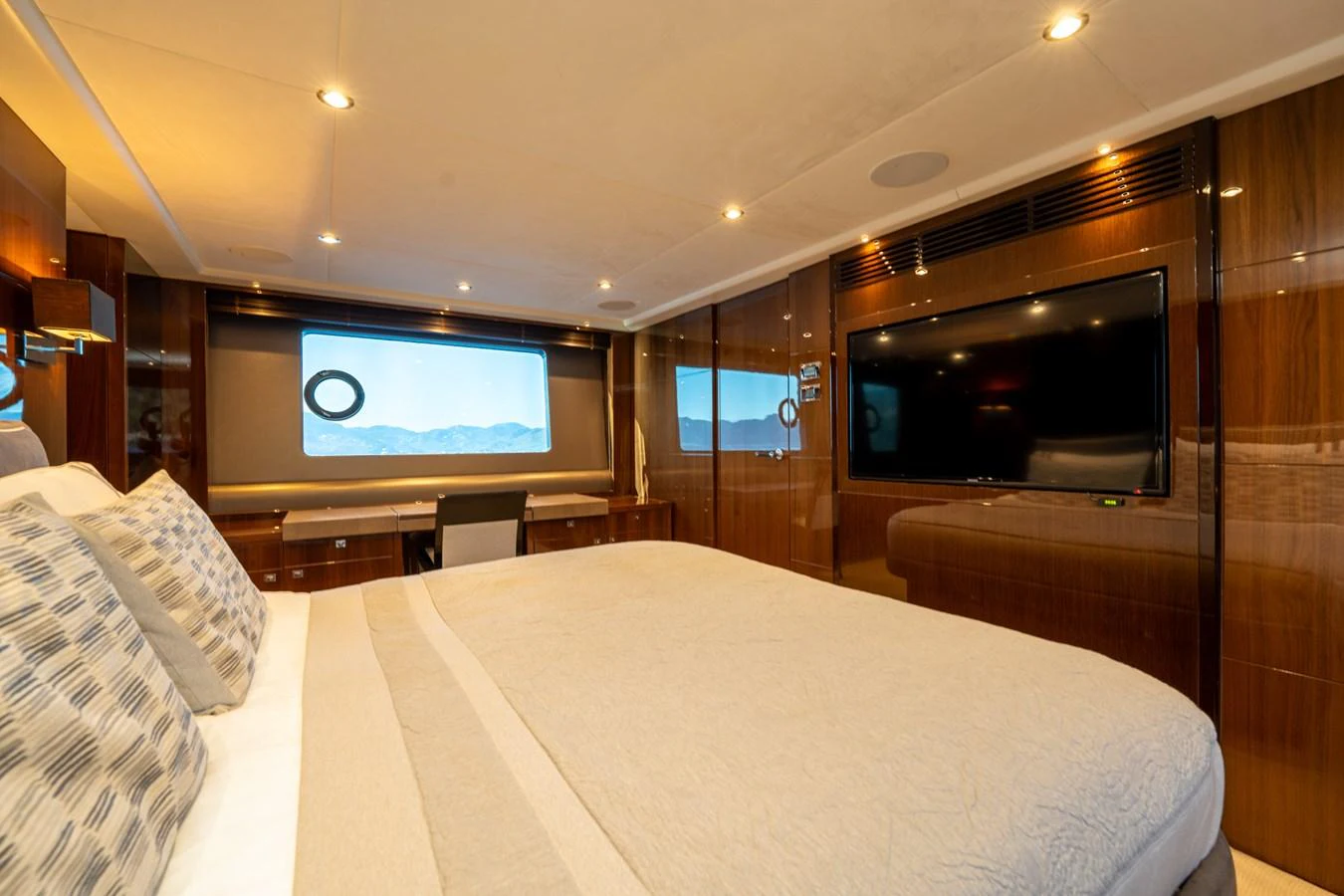 a hotel room with a tv on the wall aboard MY LADY Yacht for Sale