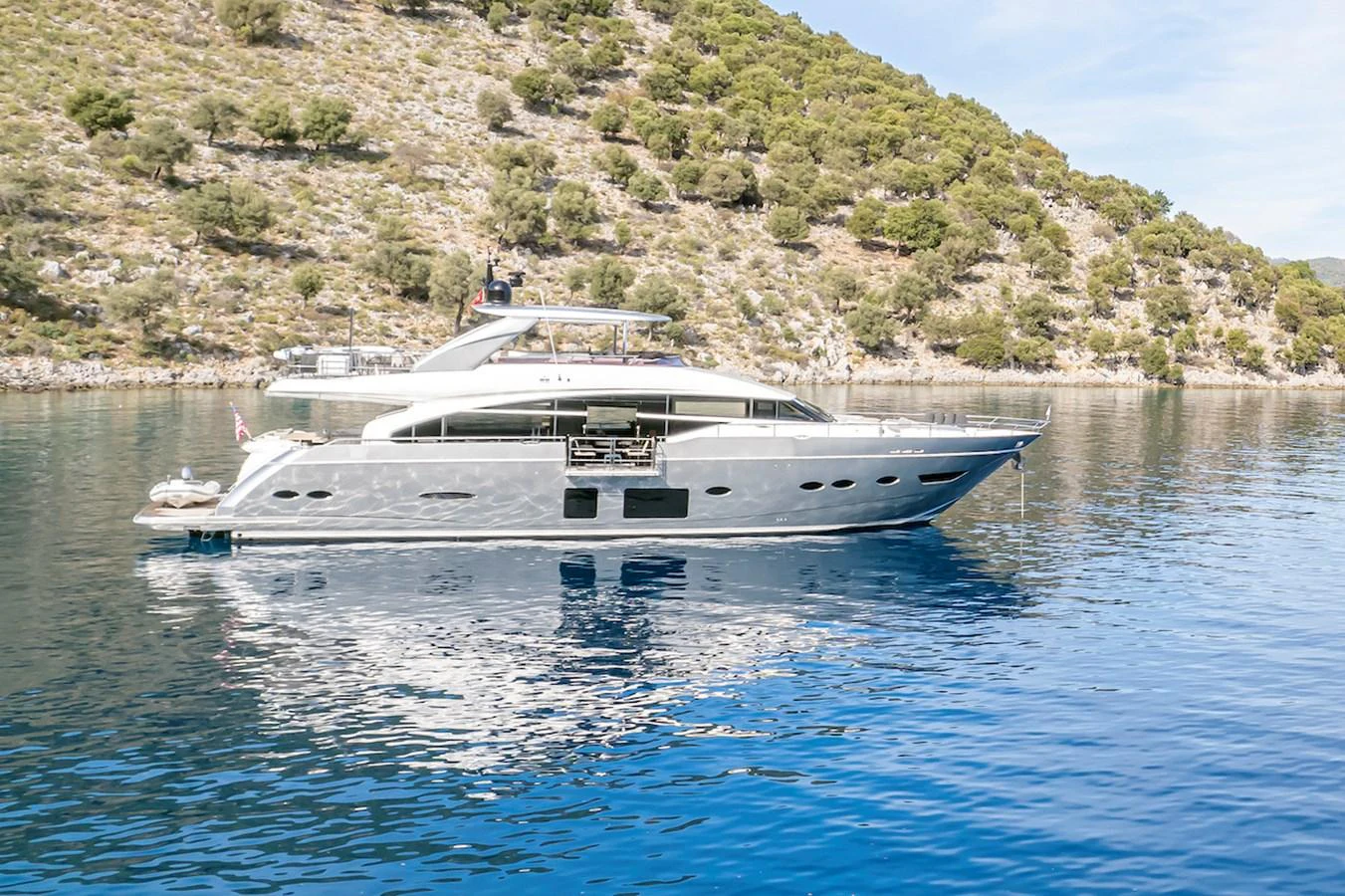 a white yacht on the water aboard LADY PARISA Yacht for Sale