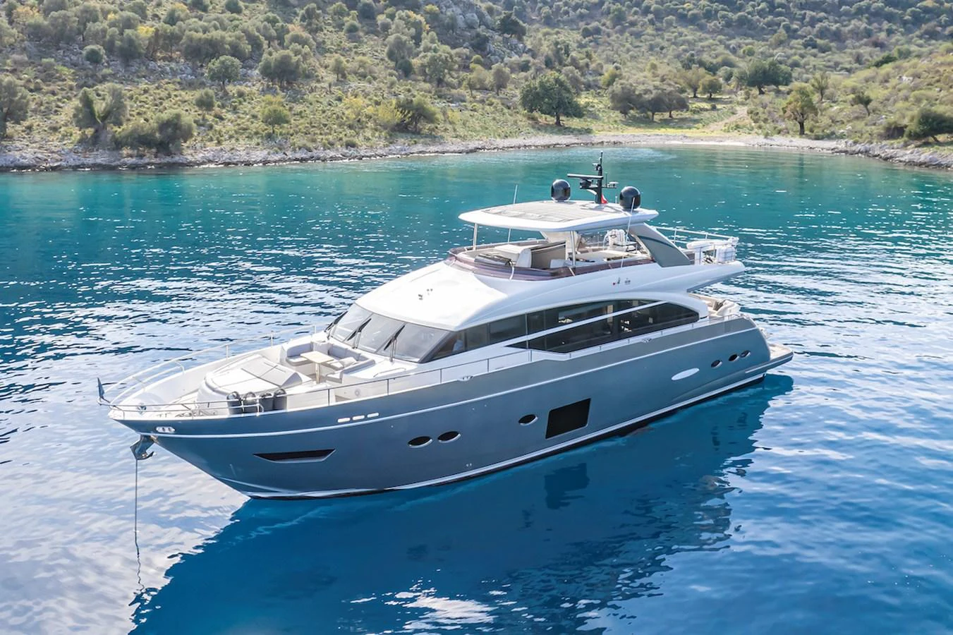 a white yacht on the water aboard LADY PARISA Yacht for Sale