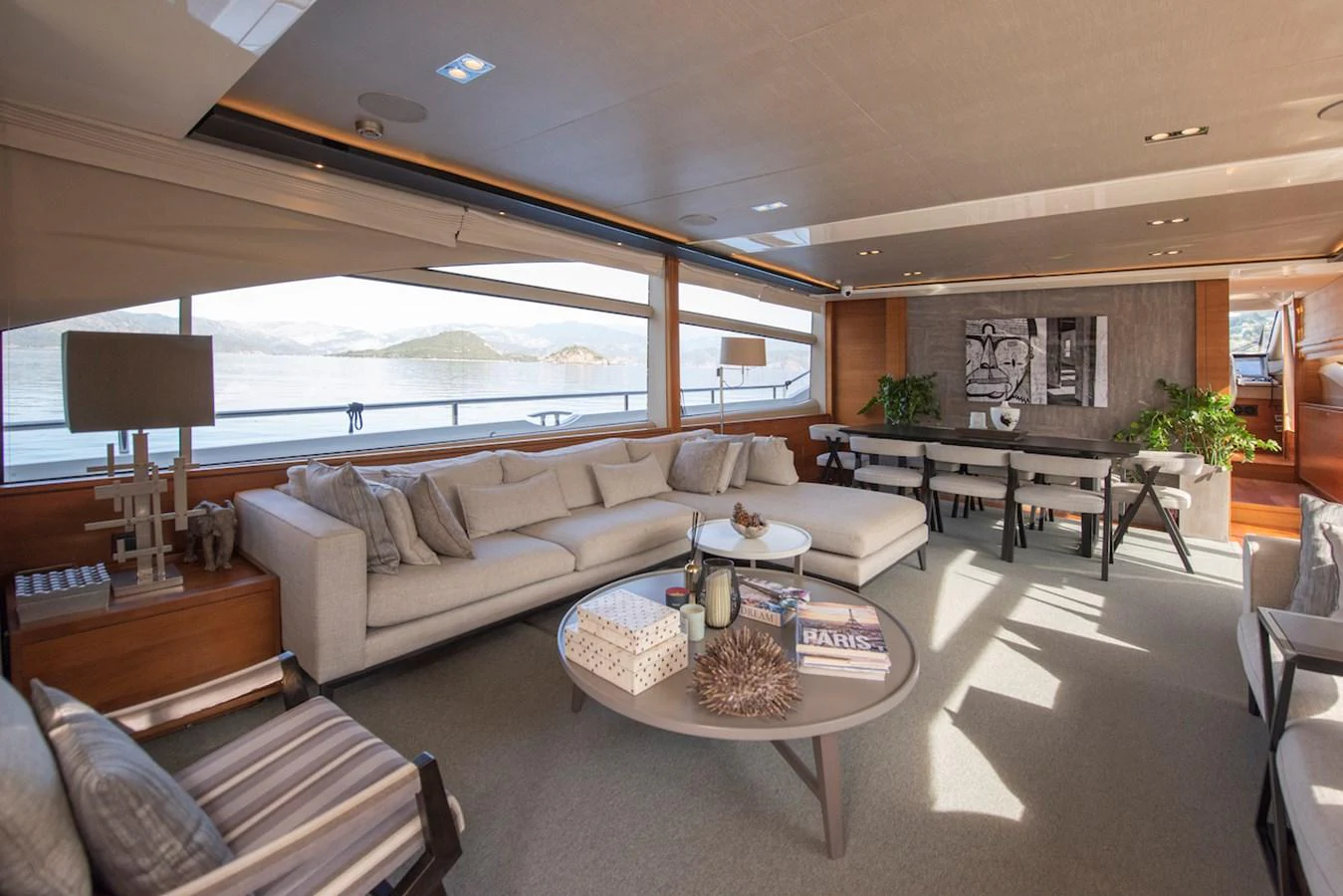 a living room with a large window aboard LADY PARISA Yacht for Sale