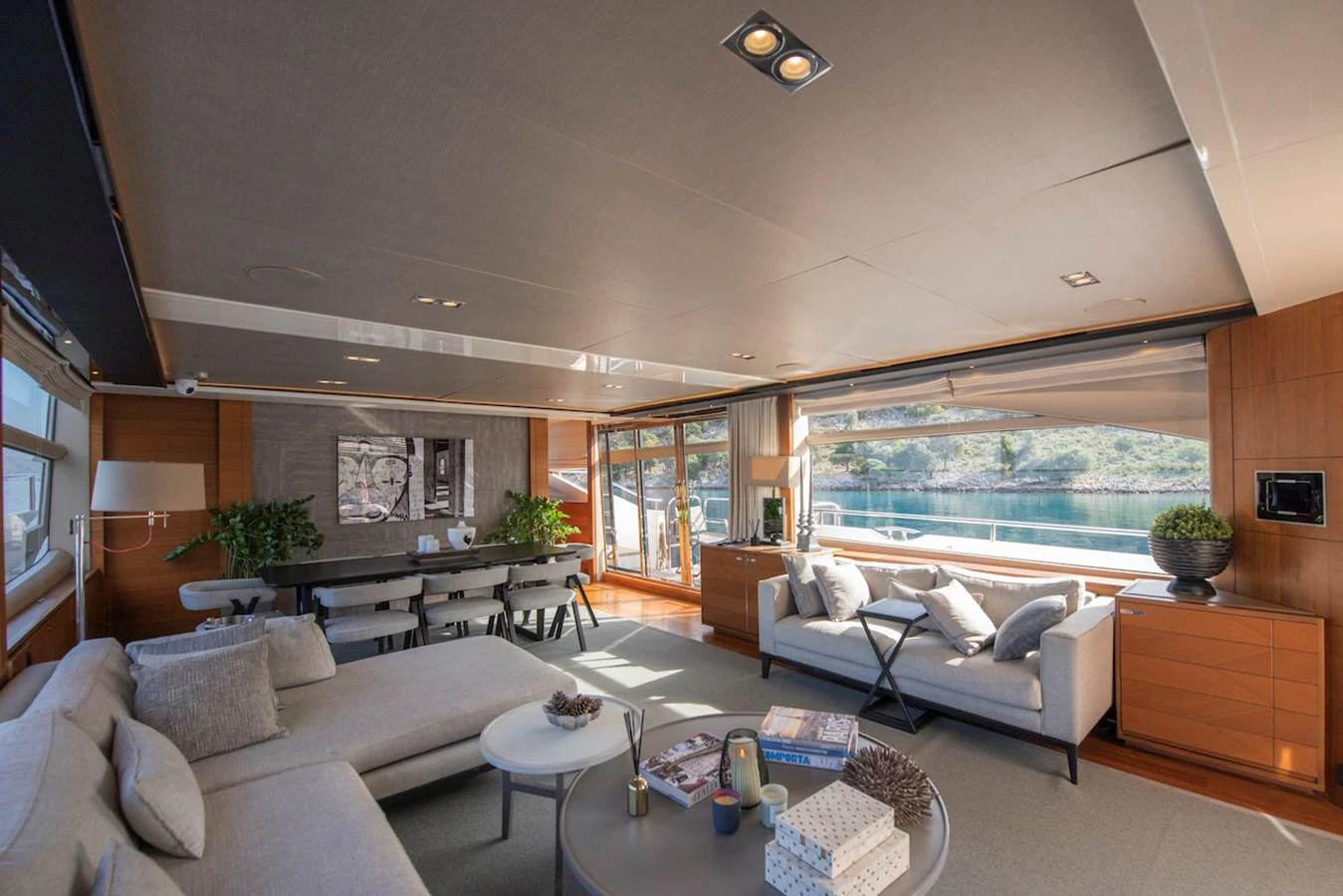 a living room with a large window aboard LADY PARISA Yacht for Sale
