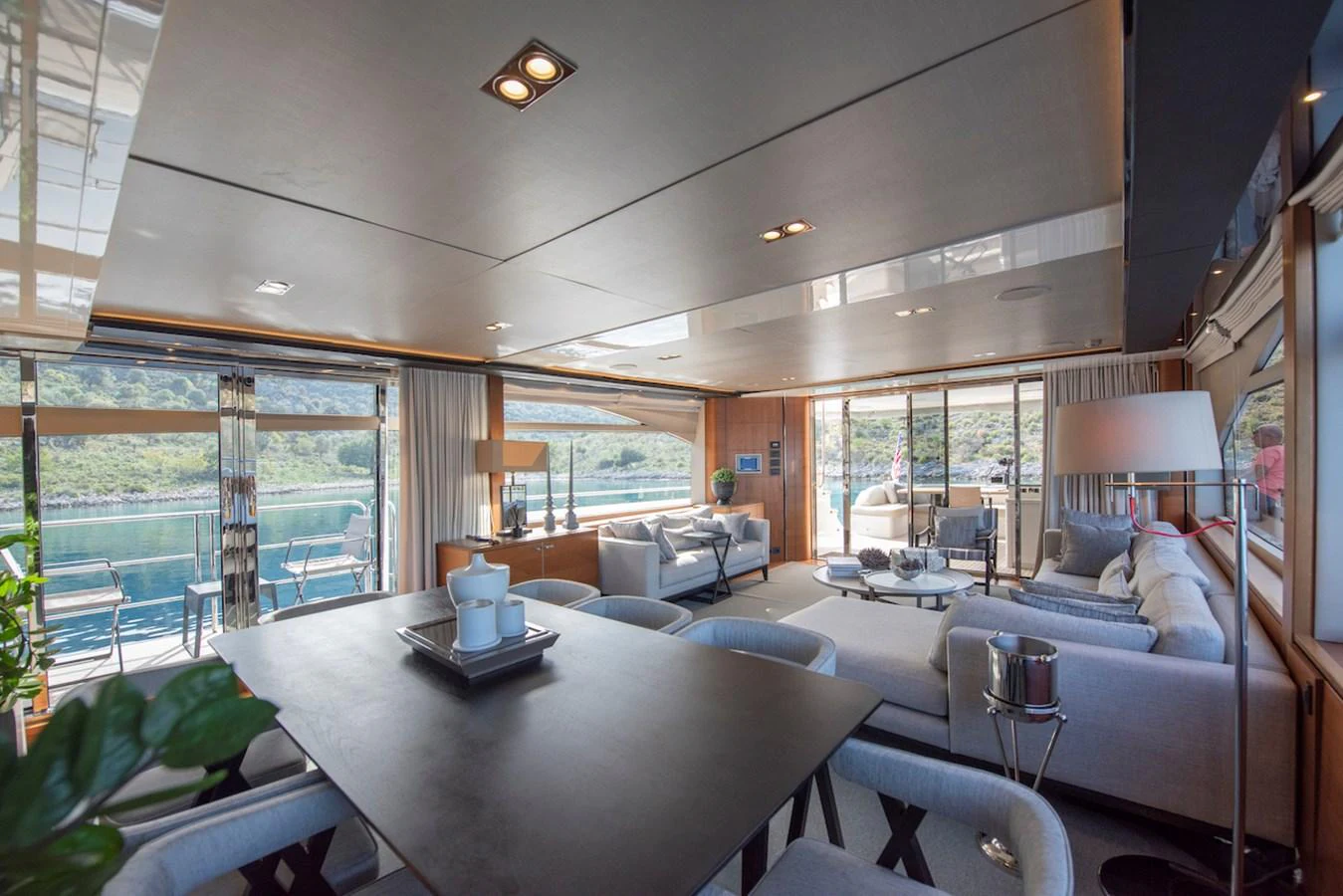 a living room with a large window aboard LADY PARISA Yacht for Sale
