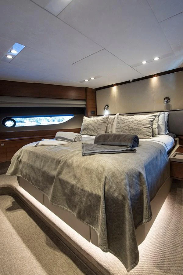 a bed with a large bed aboard LADY PARISA Yacht for Sale