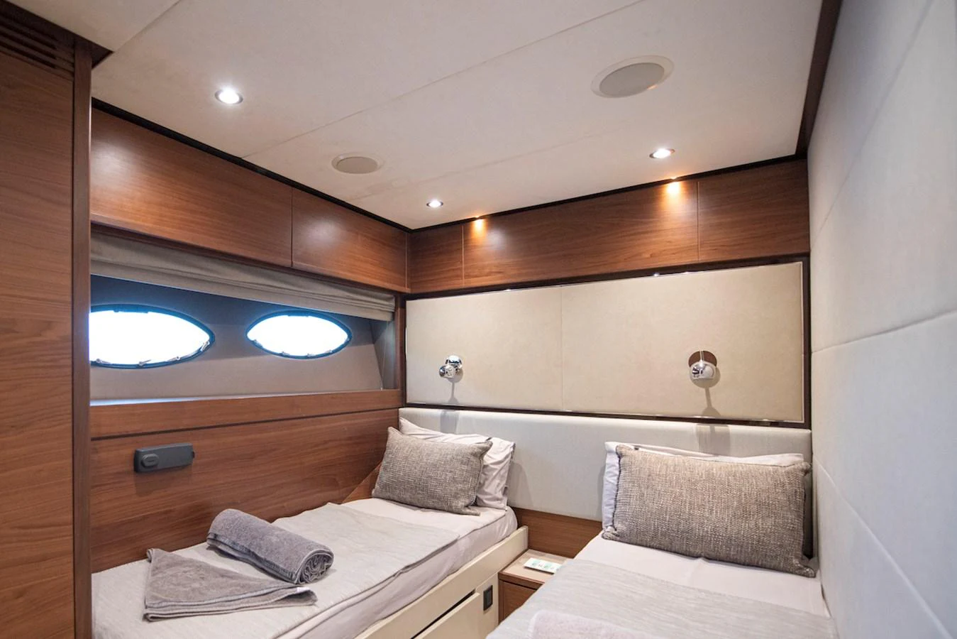 a room with a bed and a television aboard LADY PARISA Yacht for Sale