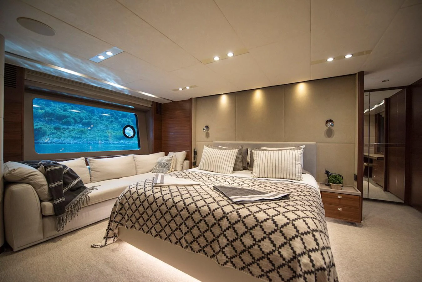 a large bedroom with a large bed aboard LADY PARISA Yacht for Sale