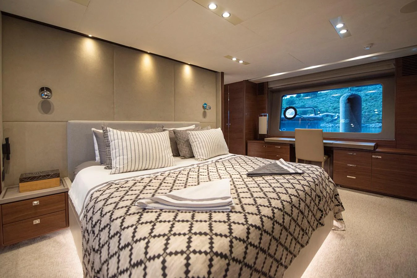 a hotel room with a large tv aboard LADY PARISA Yacht for Sale