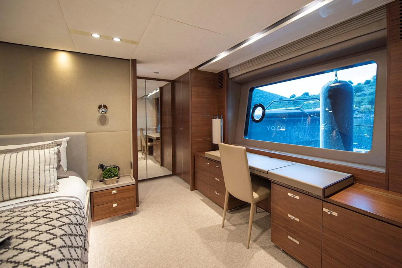 a bedroom with a large tv aboard LADY PARISA Yacht for Sale