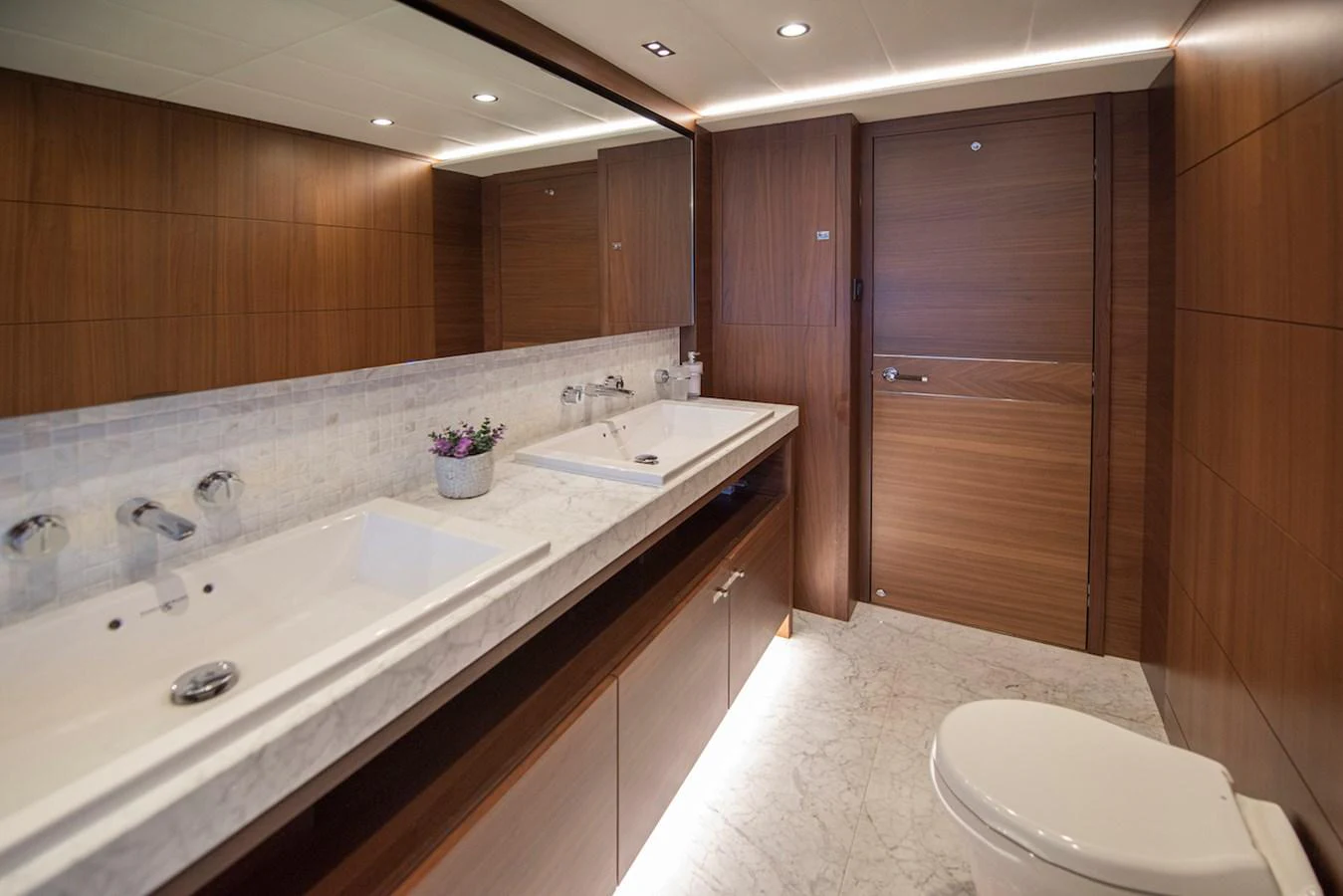 a bathroom with a large countertop aboard LADY PARISA Yacht for Sale