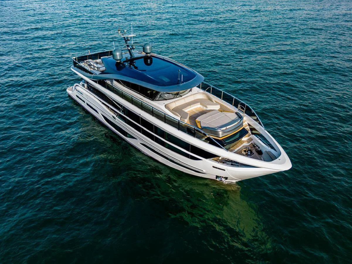 A sleek and modern yacht glides gracefully on the open water, showcasing its luxurious design and spacious deck areas. aboard SEMIA Yacht for Sale