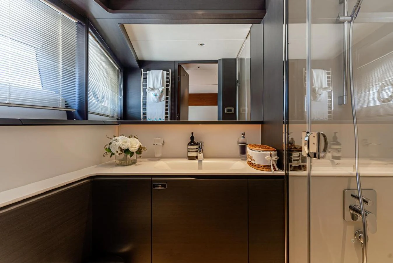 A luxurious yacht bathroom featuring modern fixtures and elegant decor. aboard SEMIA Yacht for Sale