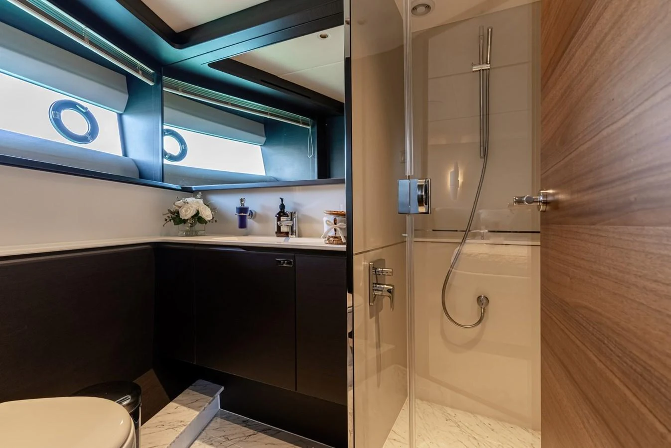 The yacht's bathroom features modern fixtures and a sleek design. aboard SEMIA Yacht for Sale