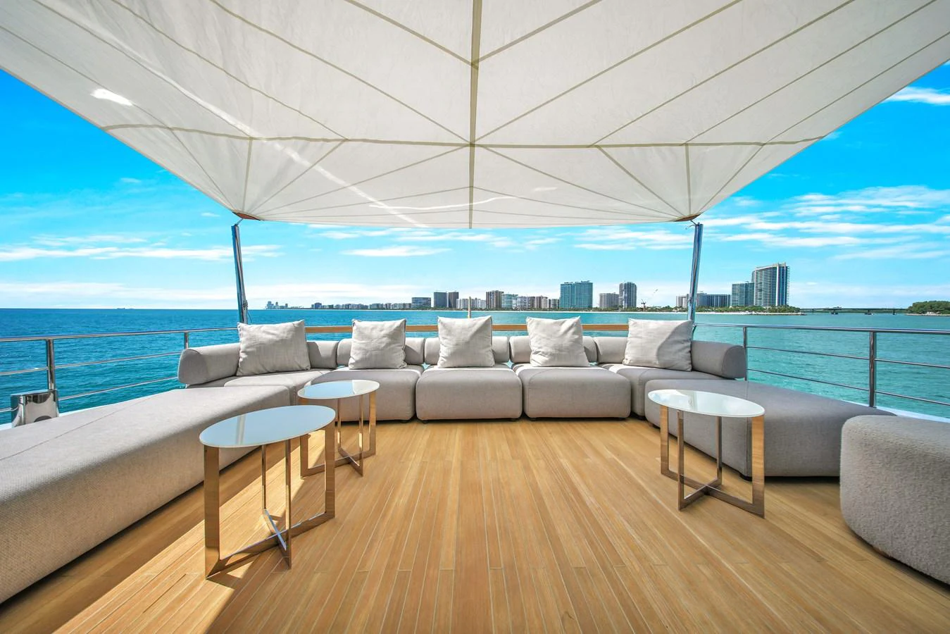 The sundeck offers a spacious and luxurious seating area with stunning ocean views. aboard AIDA Yacht for Sale